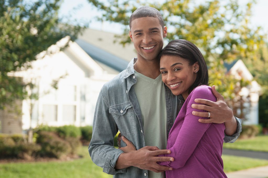 happy home buyers finding their first home