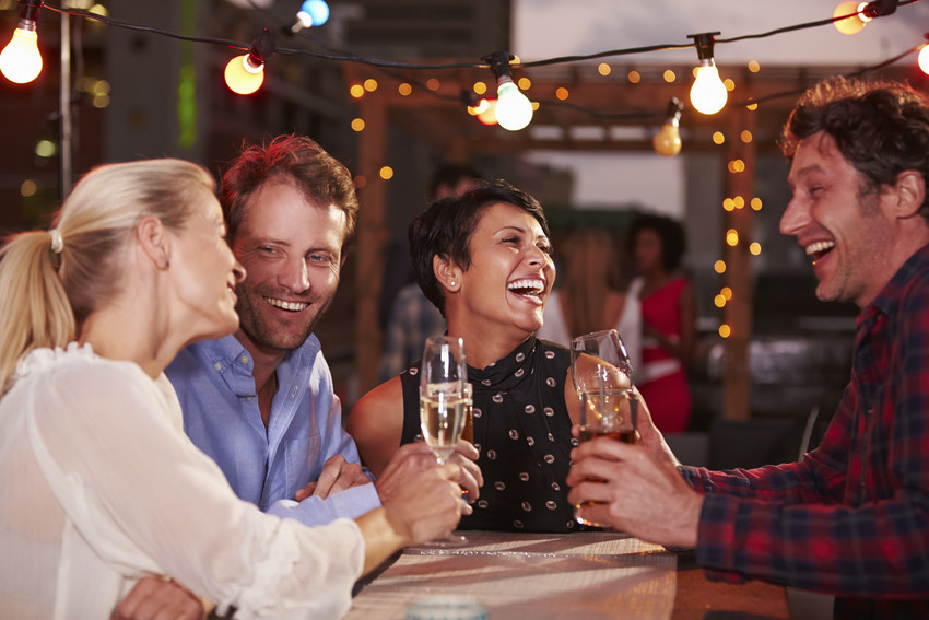 neighbors enjoying drinks togethe